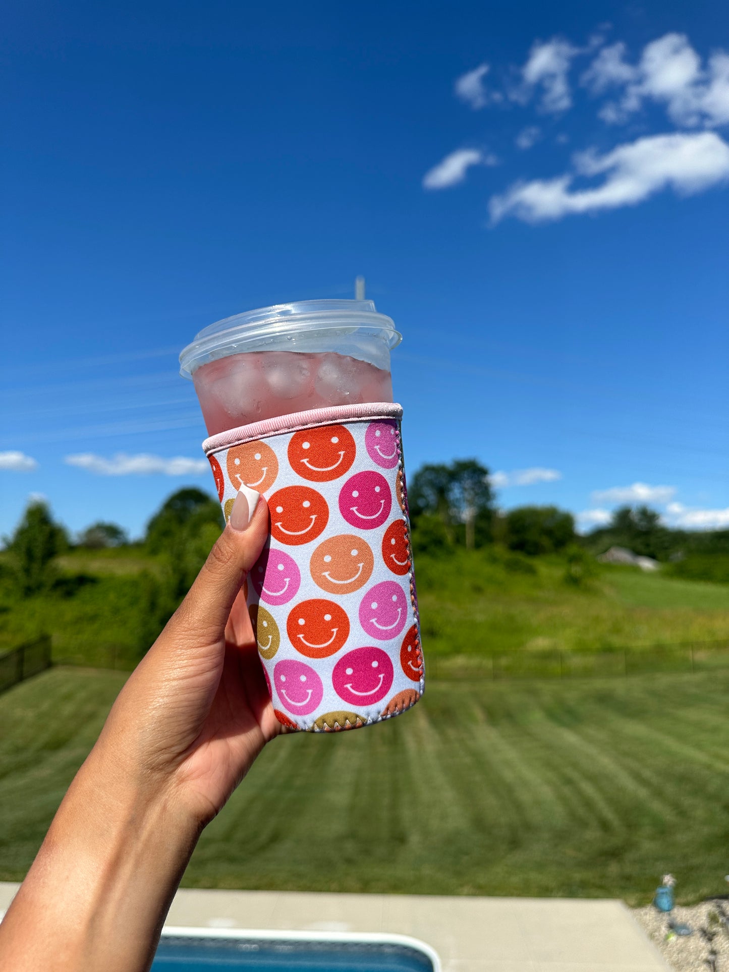 Smiley face cup coozie